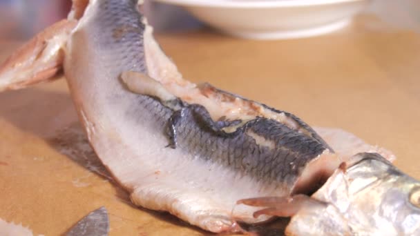 Female Hands Cuts Herring Removes Skin Home Kitchen Slow Motion — Stock Video