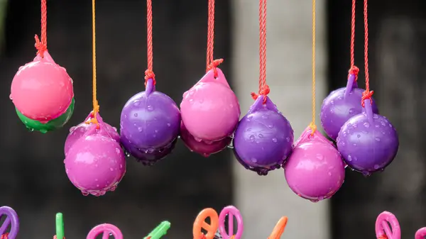 stock image Selective focus photo of Lato-Lato, a traditional children's toy which is currently going viral, especially in Indonesia. Many children play this toy.