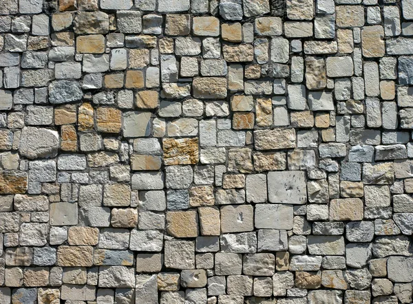 背景と壁紙のための石の壁の表面 — ストック写真