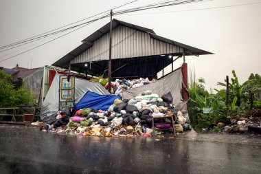 The garbage disposal depot in Yogyakarta, Indonesia temporarily closed. clipart