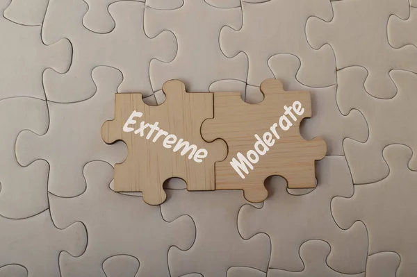 Wooden Jigsaw Puzzle Text Extreme Moderate — Stock Photo, Image