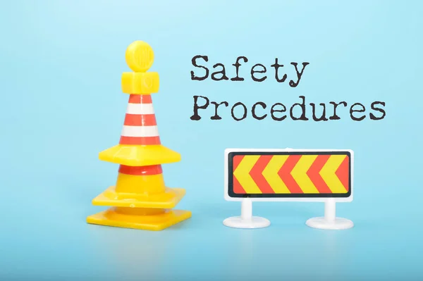 Yellow Traffic Cones Safety Barrier Isolated Blue Background Text Safety — Stock Photo, Image