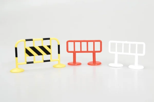 stock image under construction barrier isolated on a white background.