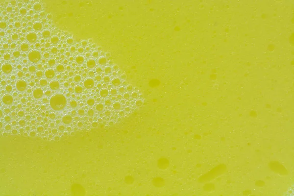 Widok Bliska Pęcherzyki Żółty Płyn Prania Tworząc Pęcherzykowe Tło — Zdjęcie stockowe