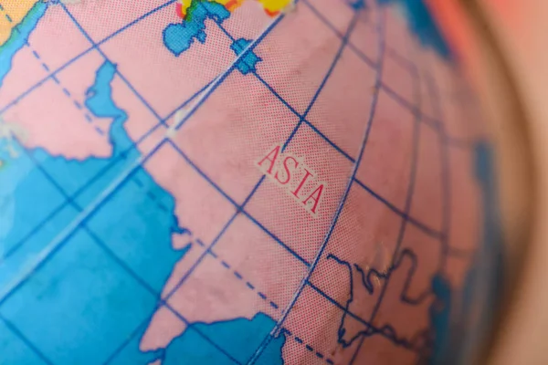 the Asia map on a globe beckons travelers to chart their journeys and immerse themselves in the rich tapestry of diverse cultures and landscapes.