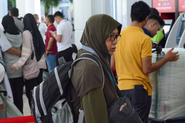 Sepang, 15 Haziran 2023: Malezyalı hacılar hac yolculuğu ile ilgili çeşitli aktivitelere başlamak için hazırlanıyorlar..