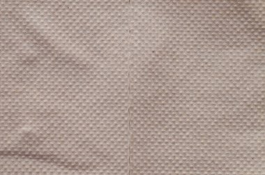 Kağıdın dokulu yüzeyi, yükseltilmiş noktaların karmaşık deseni, dokunsal bir cazibe ve derinlik hissi uyandırıyor..