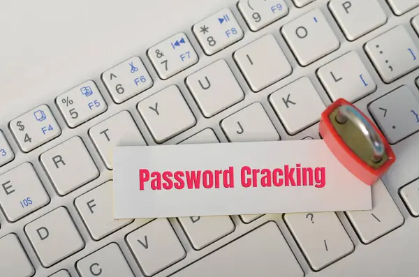 stock image The padlock on the keyboard symbolizes the importance of strong password practices and security measures to protect against password cracking attempts.