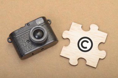 Playful Creativity Meets Serious Protection: Toy Camera and Copyright Symbol in Digital Era clipart