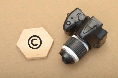 Playful Creativity Meets Serious Protection: Toy Camera and Copyright Symbol in Digital Era clipart