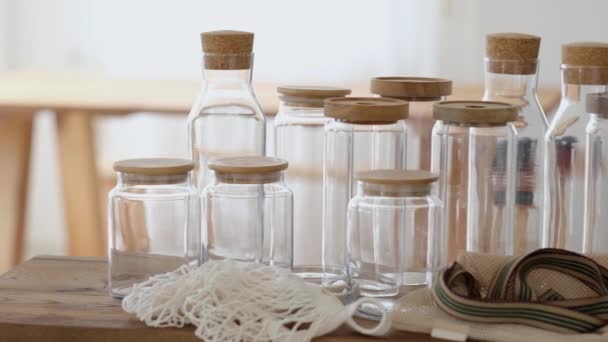 Zero Waste Concept Textile Eco Bags Empty Glass Jars Wooden — Vídeo de Stock
