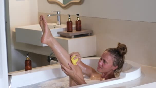 Pretty Girl Using Body Washcloth While Taking Hot Bath Home — Stock Video