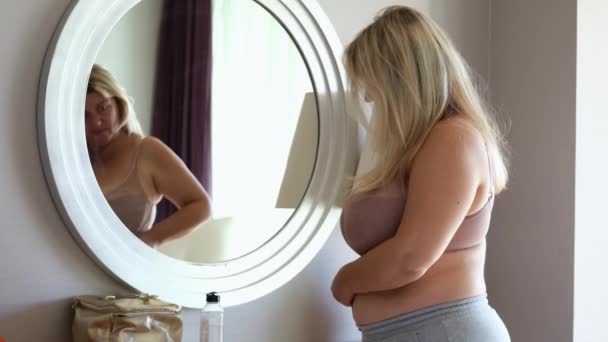 Young Blond Overweight Woman Underwear Examines Her Abs Front Mirror — Stock Video