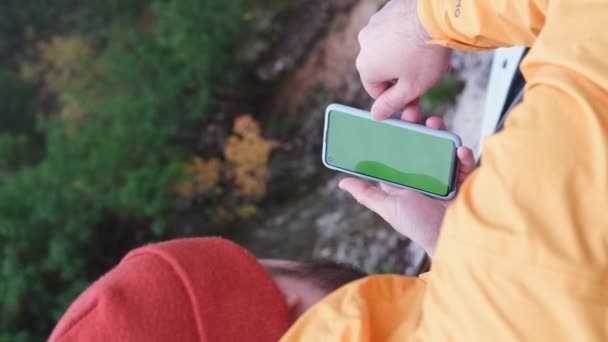 Back View Man Uses Smart Phone Green Screen Outdoor Concept — Stock Video
