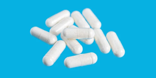 Cápsulas Terapéuticas Blancas Píldoras Vitamínicas Medicamentos Para Tratamiento Sobre Fondo — Foto de Stock