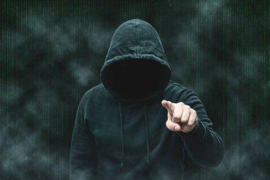 Gizemli yüzsüz, isimsiz bilgisayar korsanı, siber suçlu, terörist silueti..