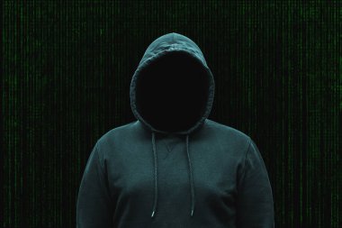 Gizemli yüzsüz, isimsiz bilgisayar korsanı, siber suçlu, terörist silueti..