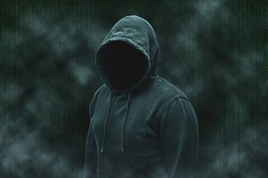 Gizemli yüzsüz, isimsiz bilgisayar korsanı, siber suçlu, terörist silueti..