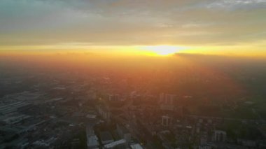 Aerial drone view of Chisinau at sunrise, Moldova. View of city centre with multiple buildings, roads, bare trees