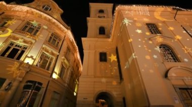 View of the Historic Centre of Sibiu with Christmas fair. Old buildings decorated with illumination