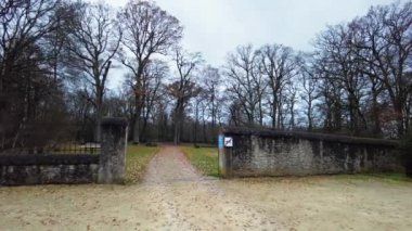 View of gardens near the Chateau de Chambord, bare trees and cloudy weather, France