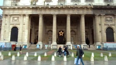 PARIS, FRANCE - DECEMBER, 2022: View of The Church of Saint-Sulpice and square with people in front of it