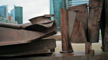 PARIS, FRANCE - DECEMBER, 2022: View of the business centre, art installation, walking people and modern buildings