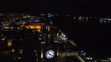 Aerial drone view of Liverpool city watch at night, United Kingdom