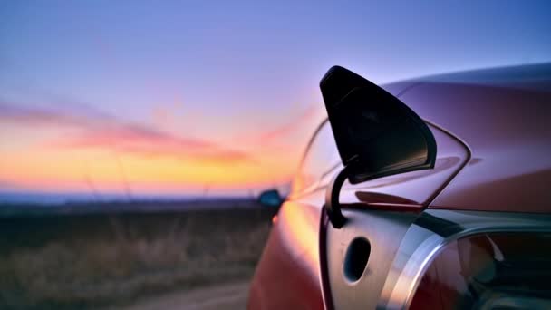 Close View Parked Red Electric Car Opening Charging Port Sunset — Stock Video