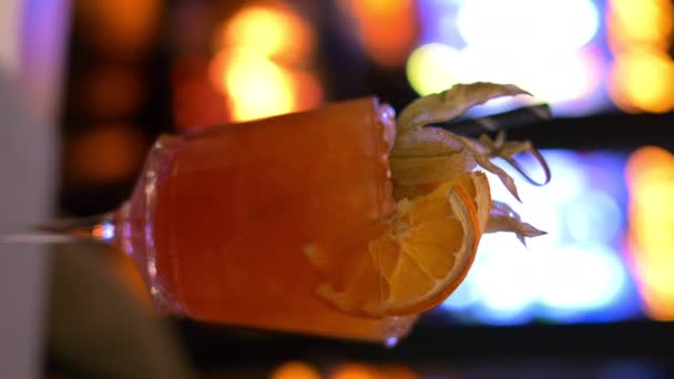 Cocktail Glass Orange Juice Vodka Restaurant Neon Lights Night — Stock Video