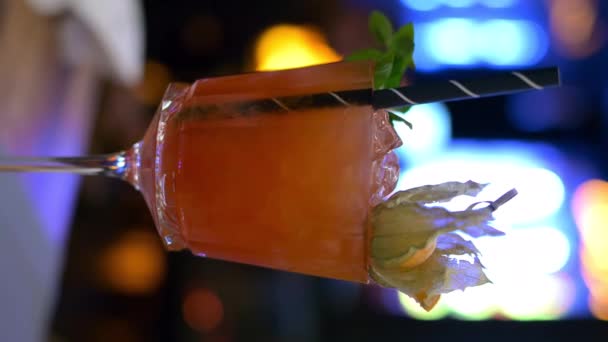 Cocktail Glass Orange Juice Vodka Restaurant Neon Lights Night — Stock Video