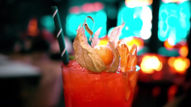 Close Orange Red Alcohol Cocktail Ice Bar Neon Lights Night — Stock Video