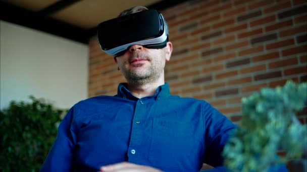 Man Gesturing While Using Virtual Reality Headset Office Stock Footage