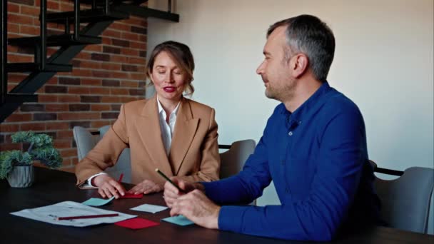 Man Woman Discussing Plans Table Office Stock Footage