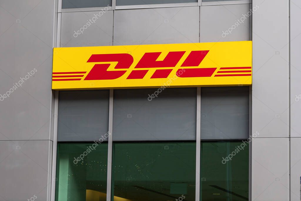 Ottawa, Canada - November 10, 2022: Sign of DHL logistics company building.