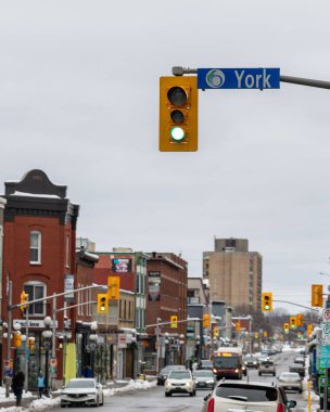 Ottawa, Canada - January 23, 2023: Urban view with traffic lights on York Street in downtown of the city