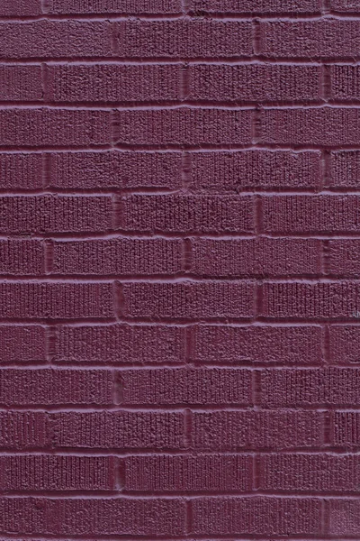 Painted purple brick wall texture vertical background
