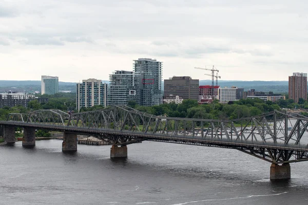 stock image Ottawa, Canada - June 17, 2023: Ottawa River and Alexandra Bridge from Ottawa to Gatineau city of Quebec, Canada