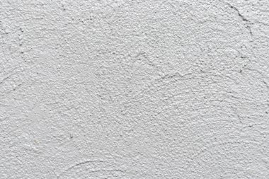 Gri boyalı taş duvar arkaplanı, soyut doku.