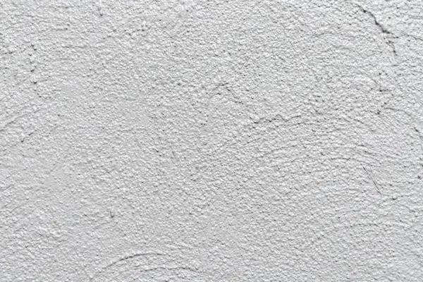 Gray painted stone wall background, abstract texture.