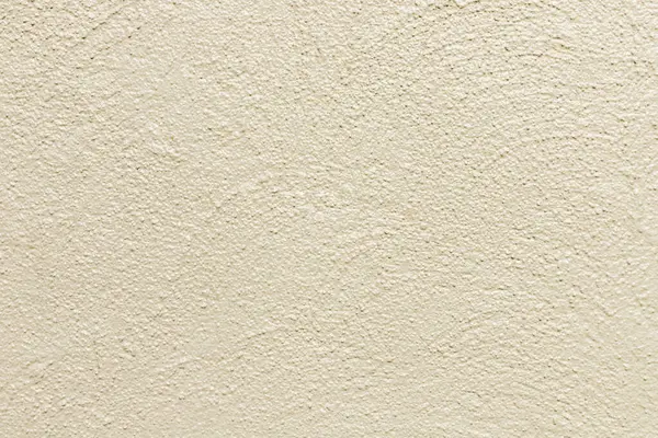 Bej boyalı taş duvar arkaplanı, soyut doku.