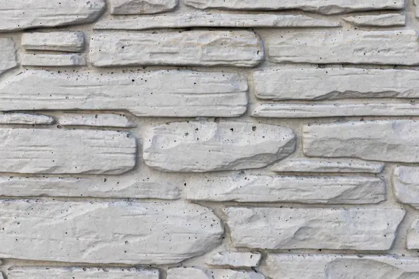 Texture of a stone wall. Old building gray textured background.