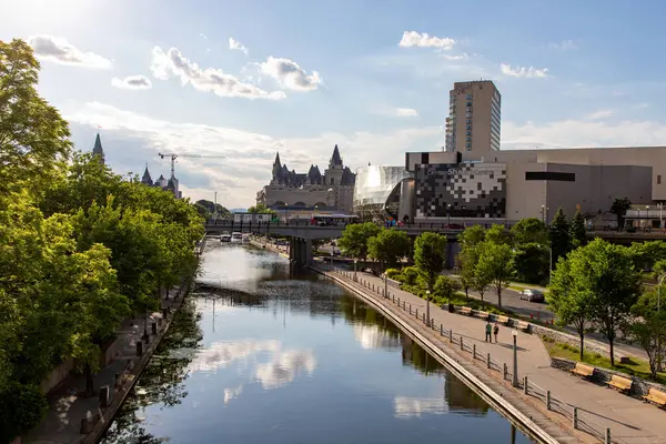 stock image Ottawa, Canada - June 4, 2024: Rideau Canal, Parliament, Laurier Castle and Shaw Centre