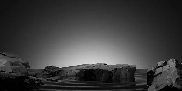 Suda sakin dalgalanmalarla çevrili kayaların minimalist siyah-beyaz bileşimi, sakin ve doğal bir atmosfer yaratıyor..