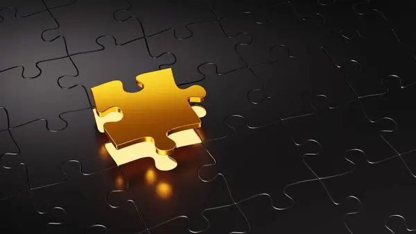 Siyah arkaplanda altın yapboz parçası