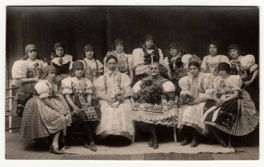 HODONIN, THE CZECHOSLOVAK REPUBLIC, 1927: Vintage photo shows girls in folk costumes, circa 1927. clipart