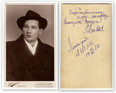 LENINGRAD, USSR - DECEMBER 10, 1953: Vintage portrait of a young man. Front and back of vintage photo with dedication. clipart