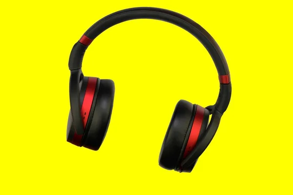 ワイヤレスステレオヘッドセット 黒と赤のコードレスヘッドフォン クリッピングパスを持つ黄色の背景に隔離されたイヤホン マクロ水平画像 クローズアップ — ストック写真