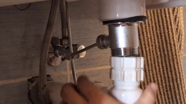 Plumber Fixes Waste Washbasin Mans Hands Fix Plumbing Bathroom Sink — Stock Video