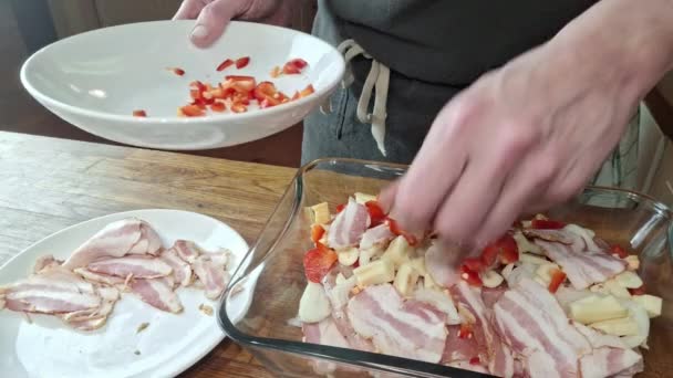 Cook Puts Slices Bacon Pieces Peppers Onions Cut Rounds Baking — Stock Video